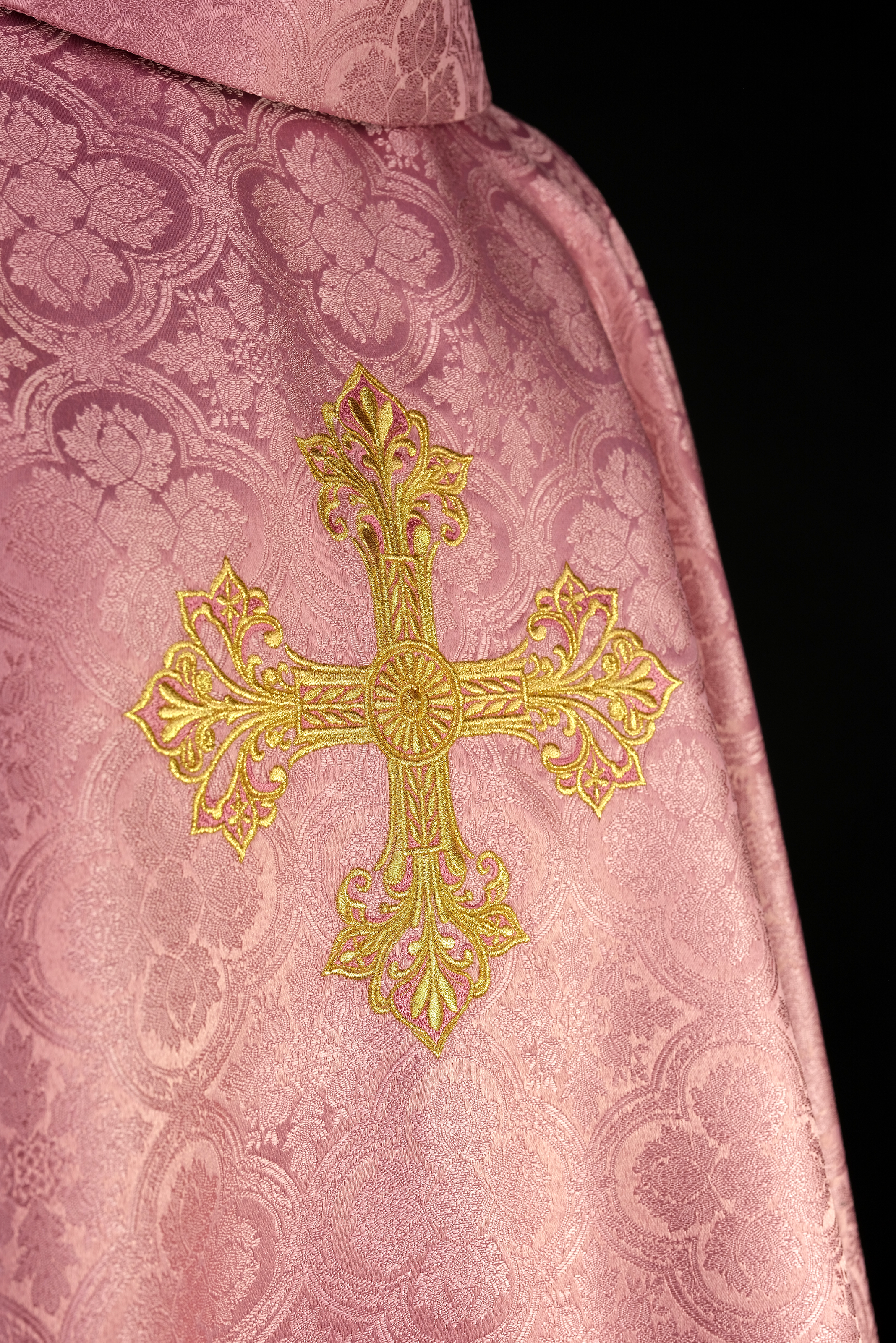 Pink chasuble with a cross made of patterned fabric