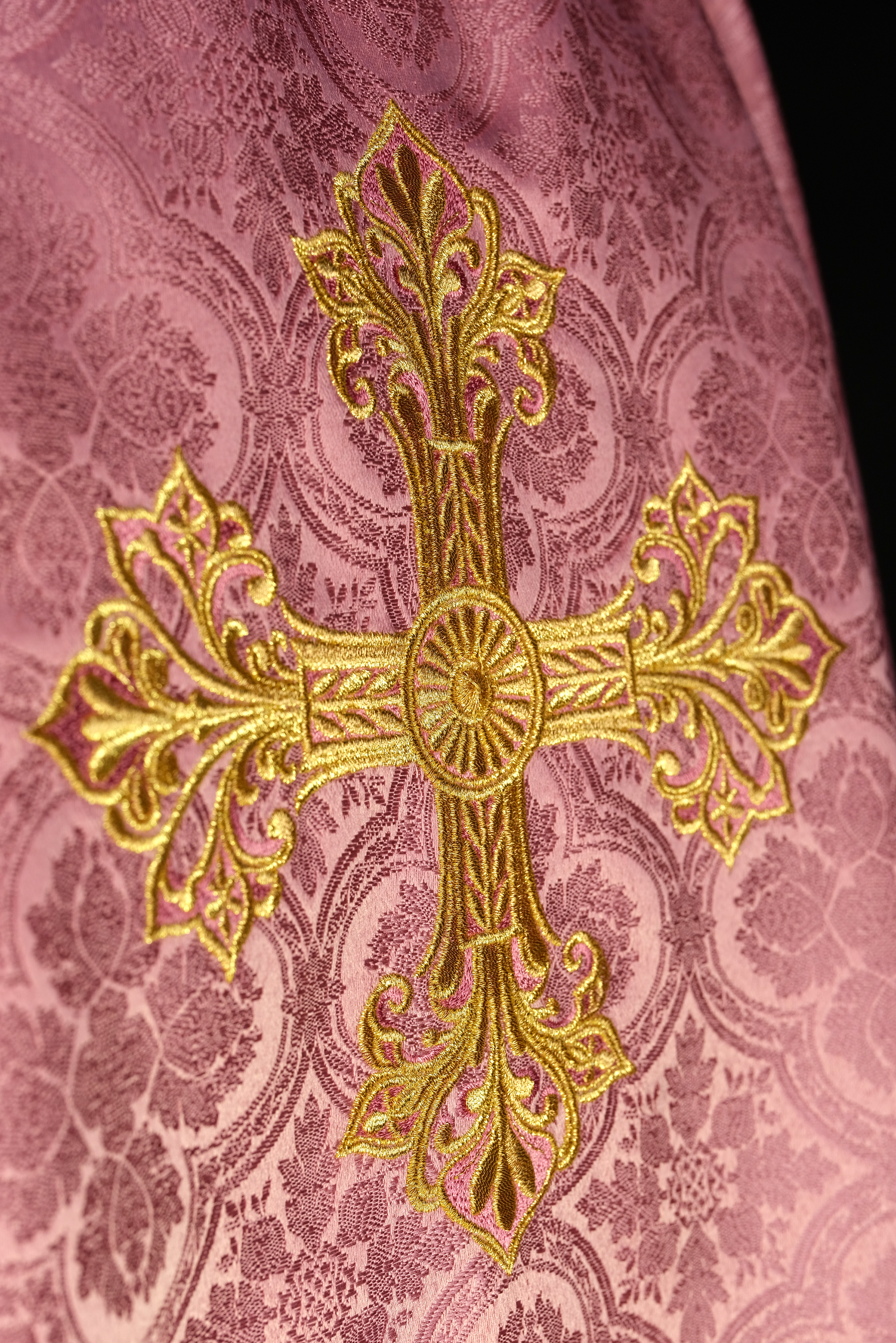 Pink chasuble with a cross made of patterned fabric