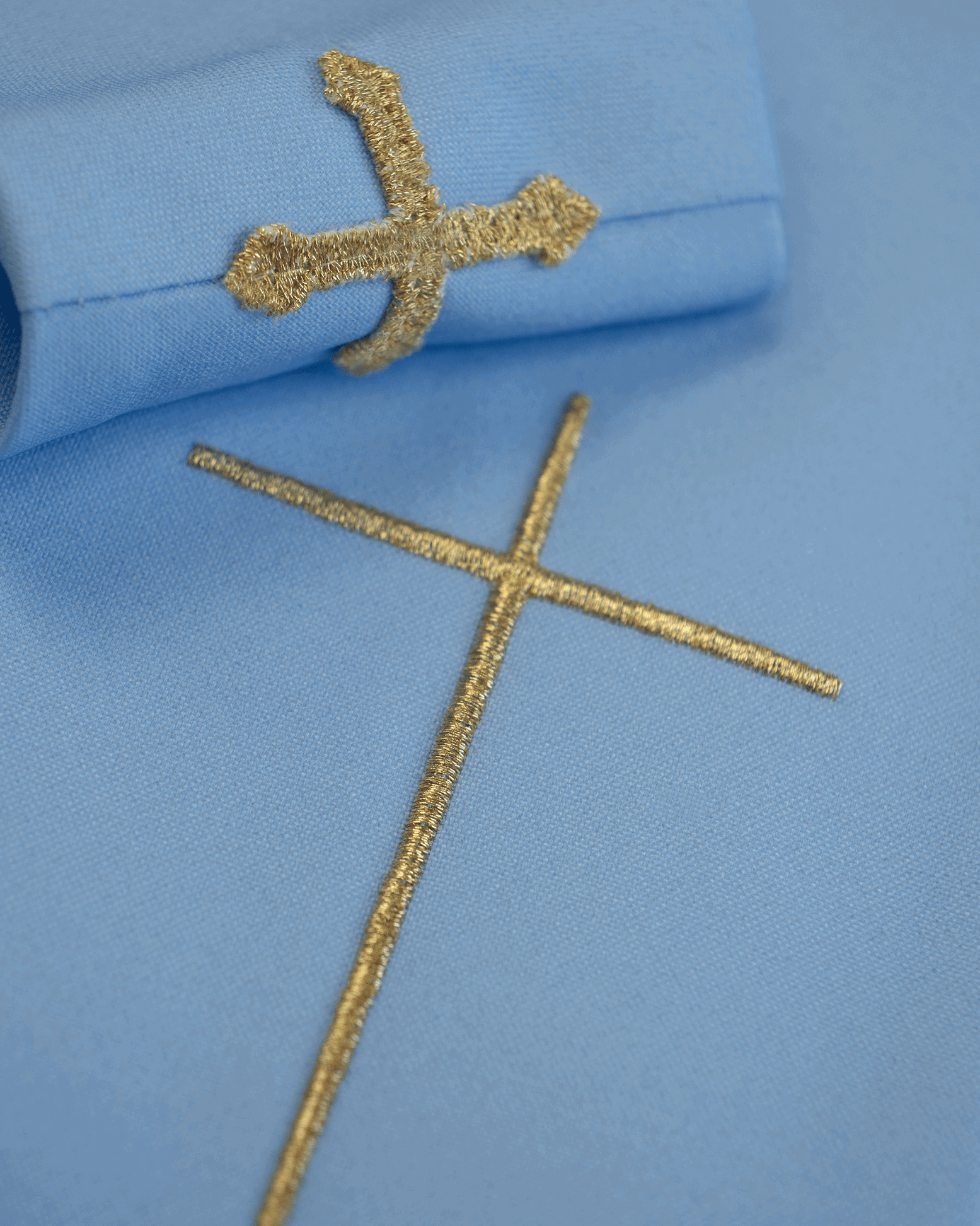 Blue liturgical chasuble with wide collar and marian symbol