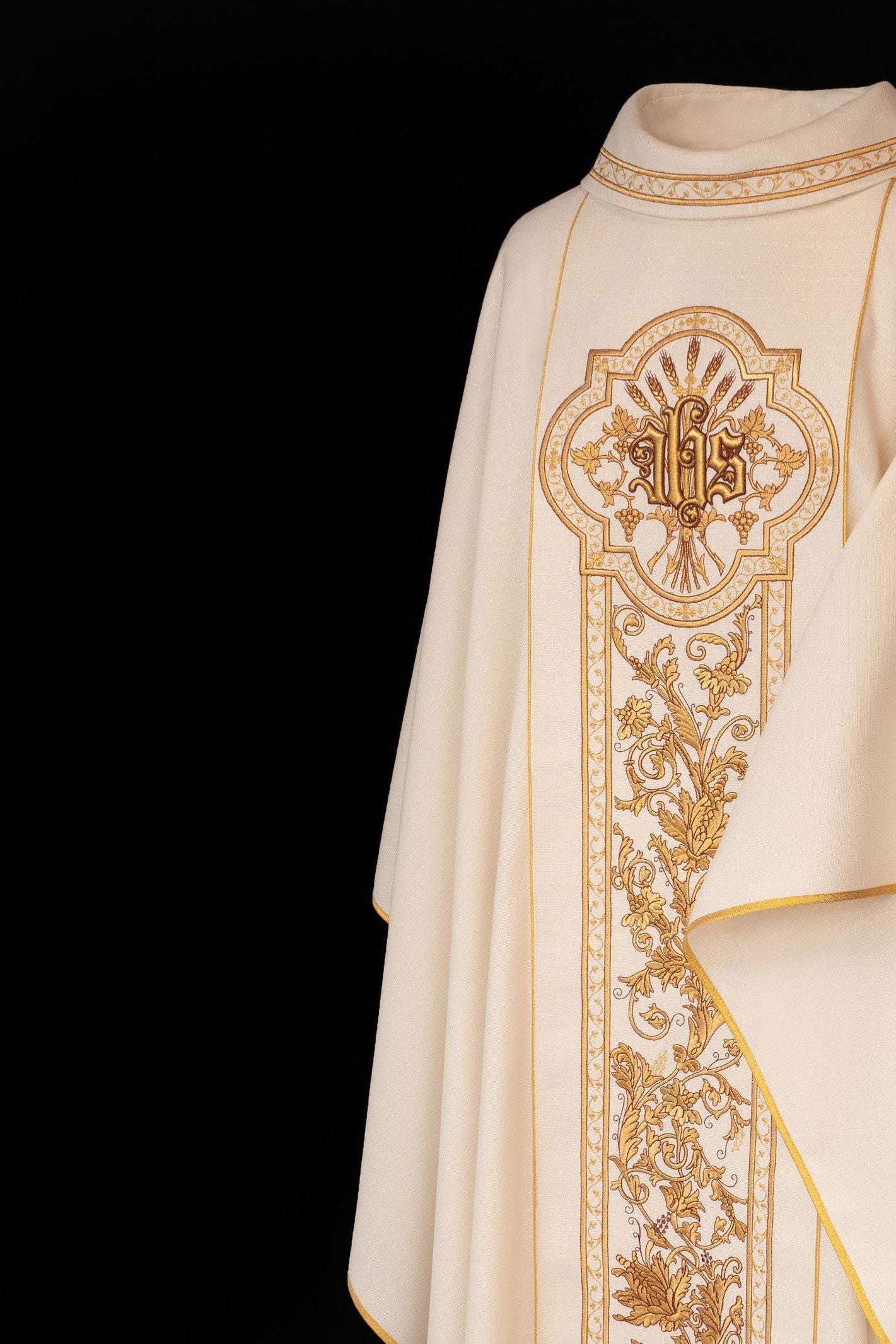 Ecru chasuble richly decorated with IHS motif