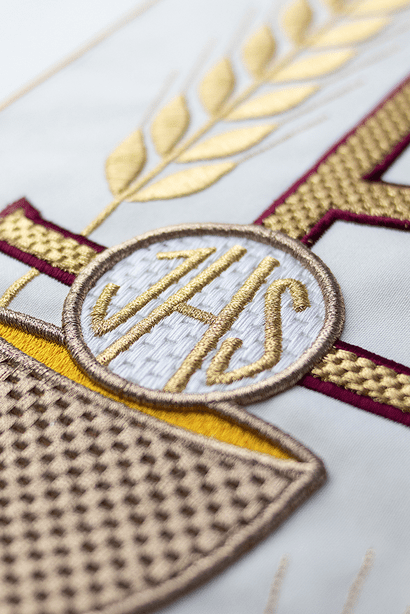 Chasuble embroidered with IHS Chalice pattern in ecru