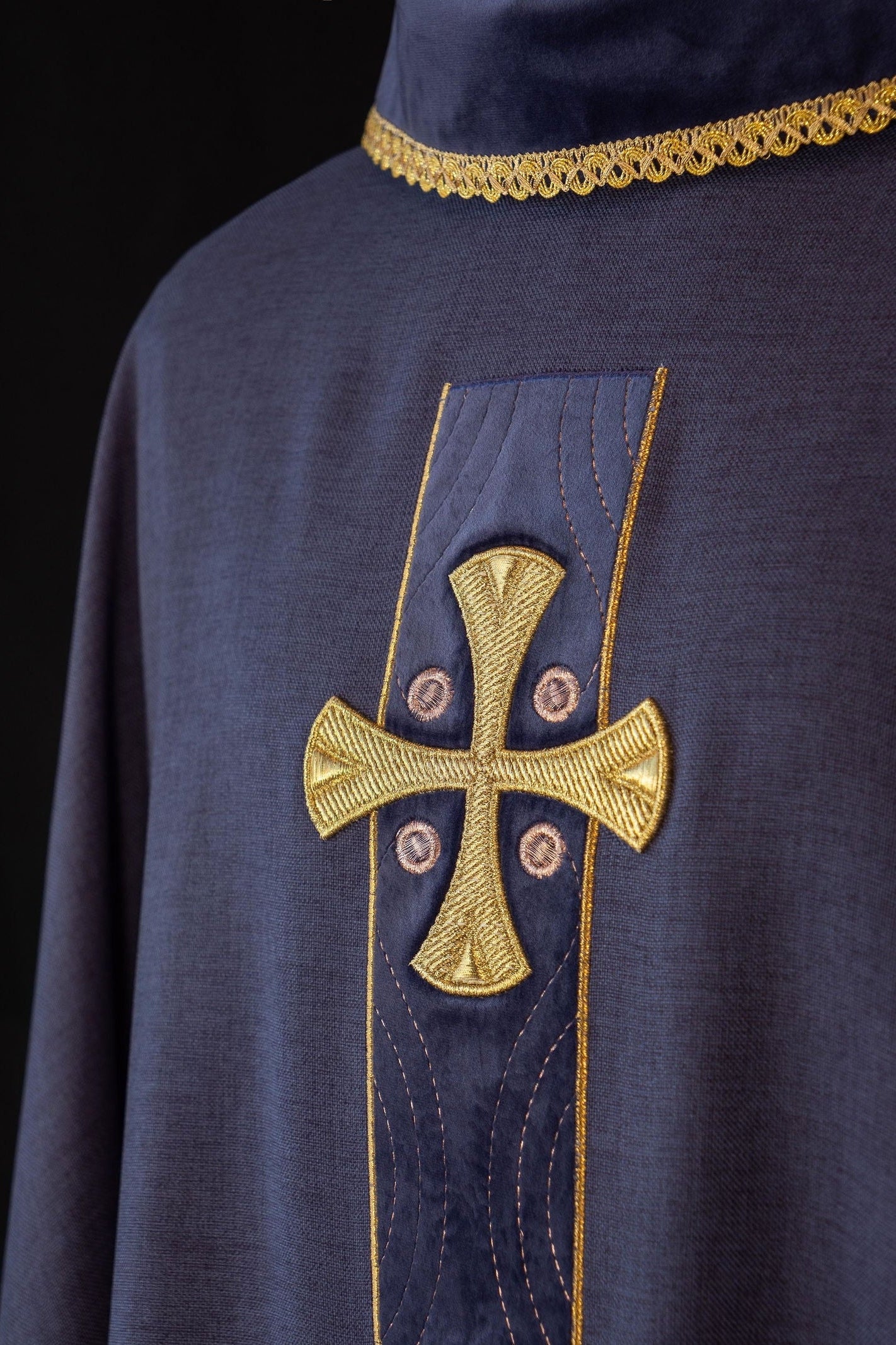 Chasuble with embroidered gold crosses and piping on the collar in purple