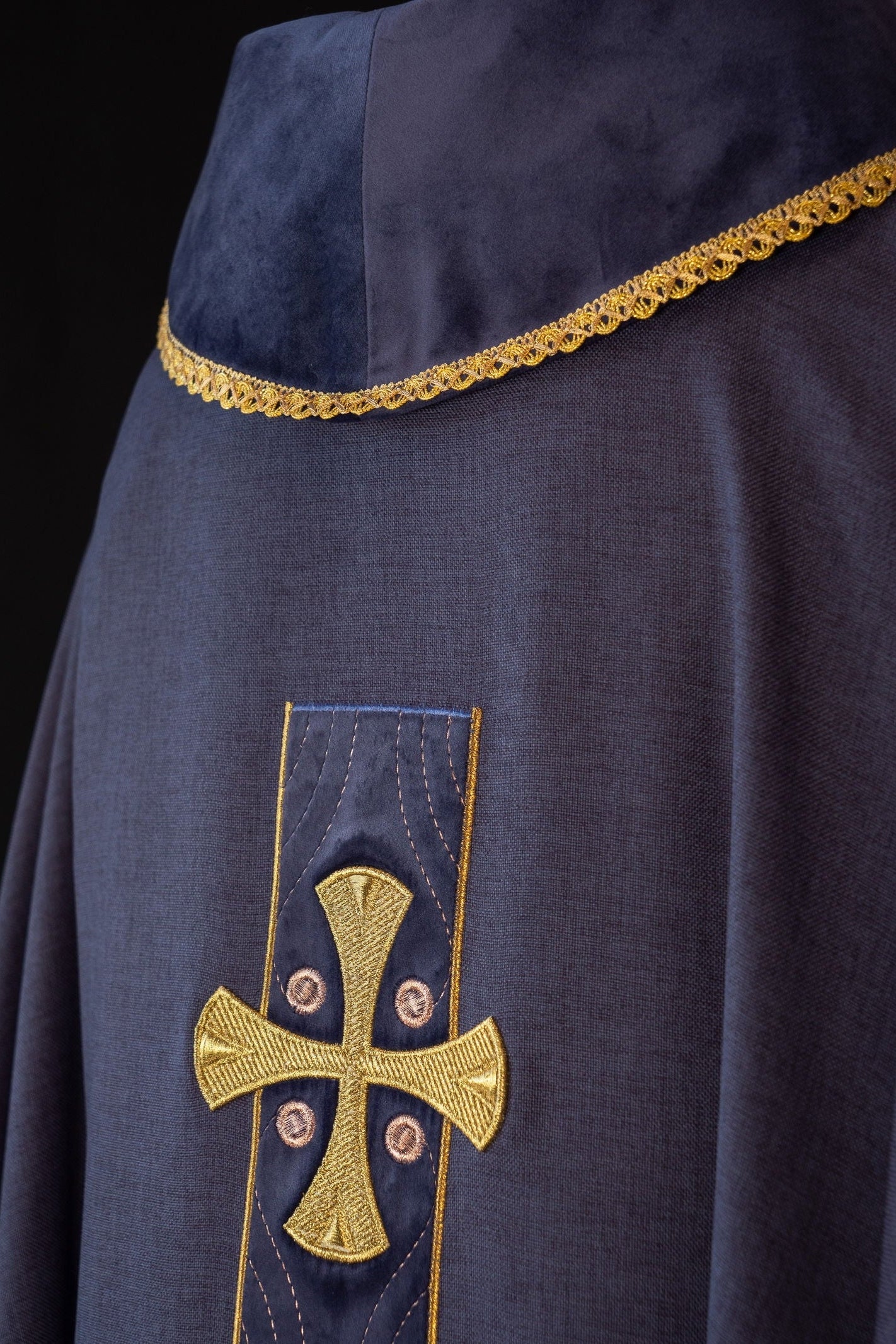 Chasuble with embroidered gold crosses and piping on the collar in purple