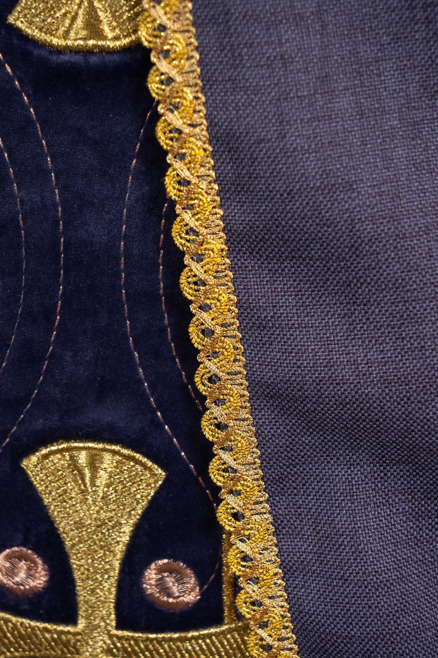 Chasuble with embroidered gold crosses and piping on the collar in purple