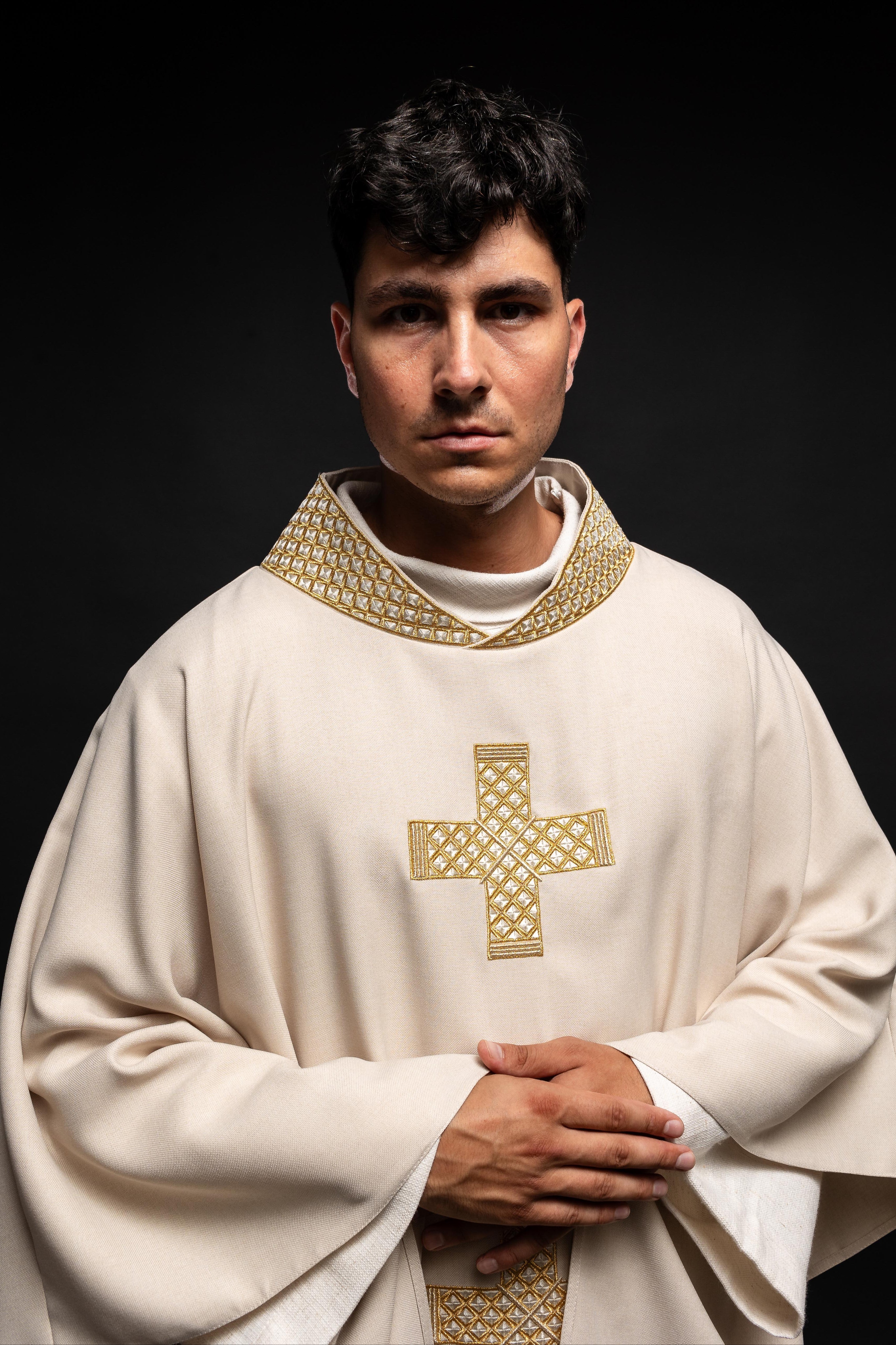 Ecru vestment with decorative collar and gold crosses