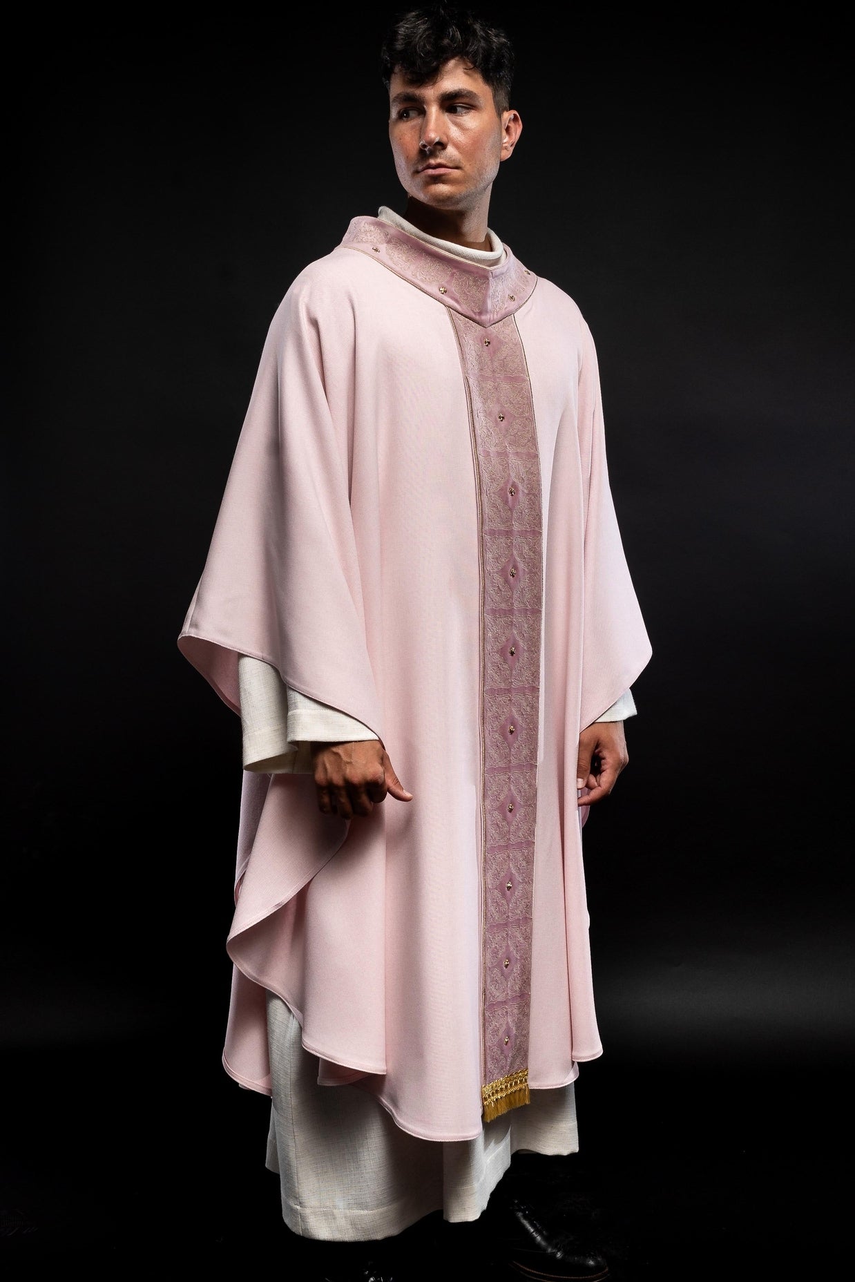 Pink priest robe made of natural touch texture and little decorative metal crosess