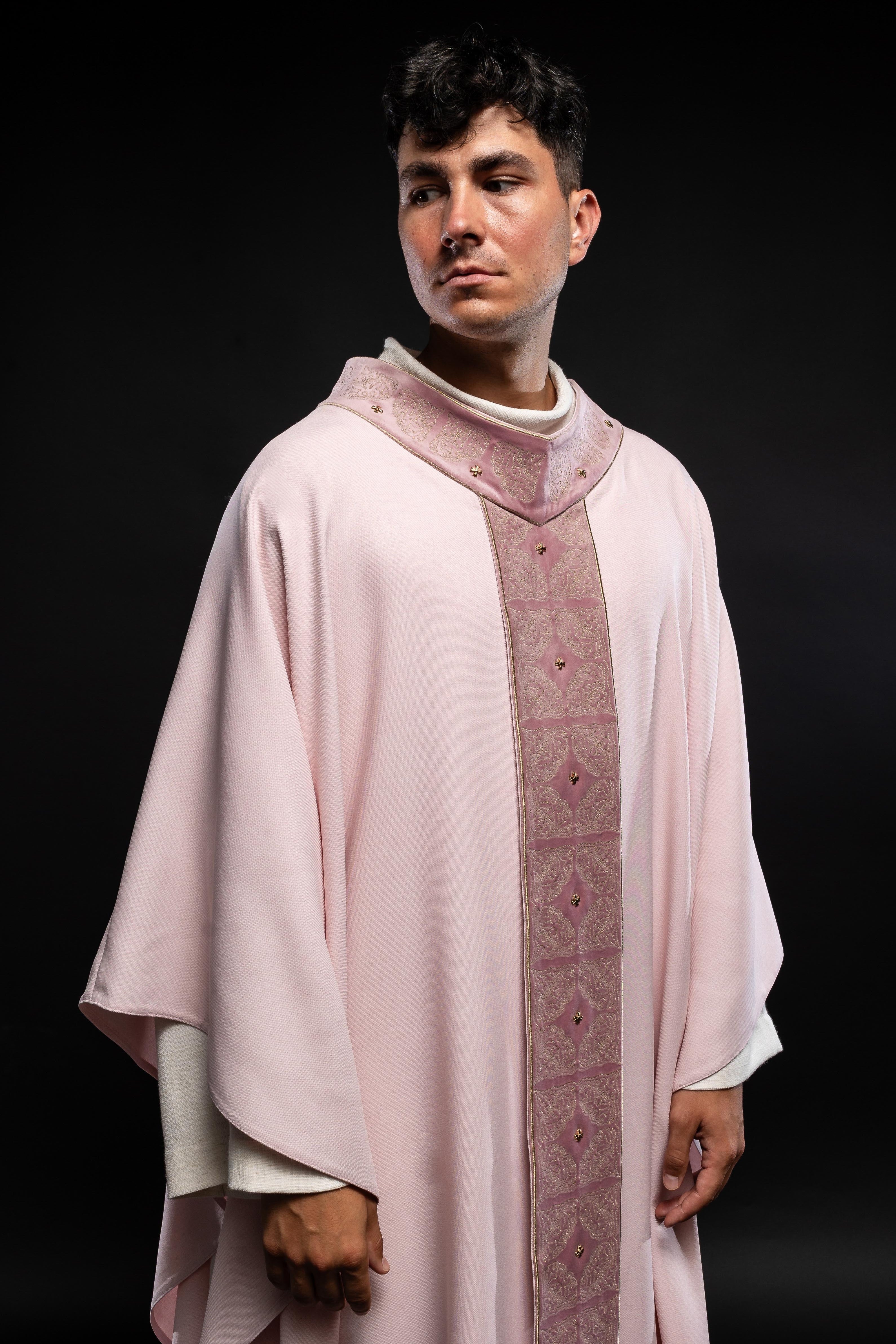 Pink priest robe made of natural touch texture and little decorative metal crosess