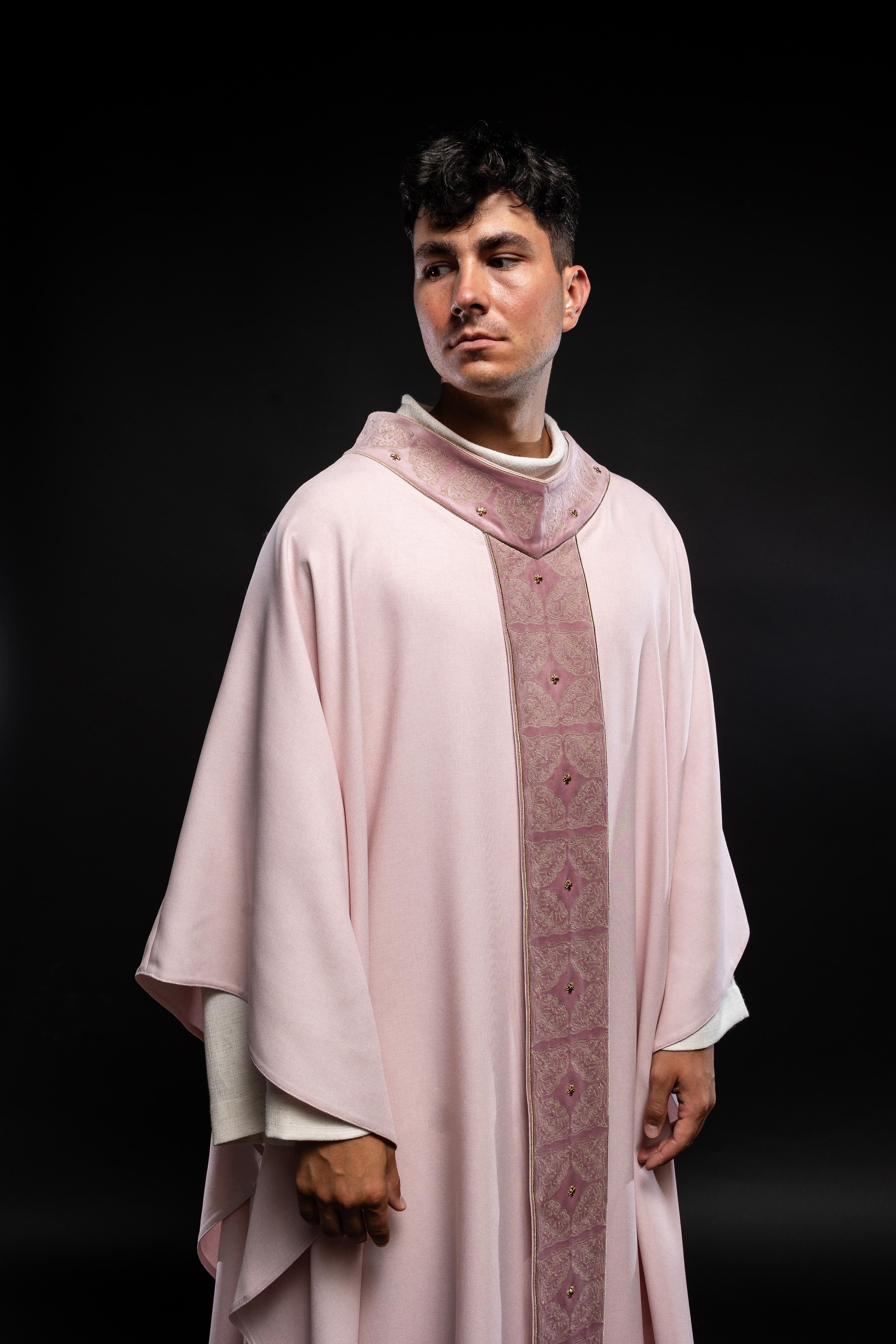 Pink priest robe made of natural touch texture and little decorative metal crosess