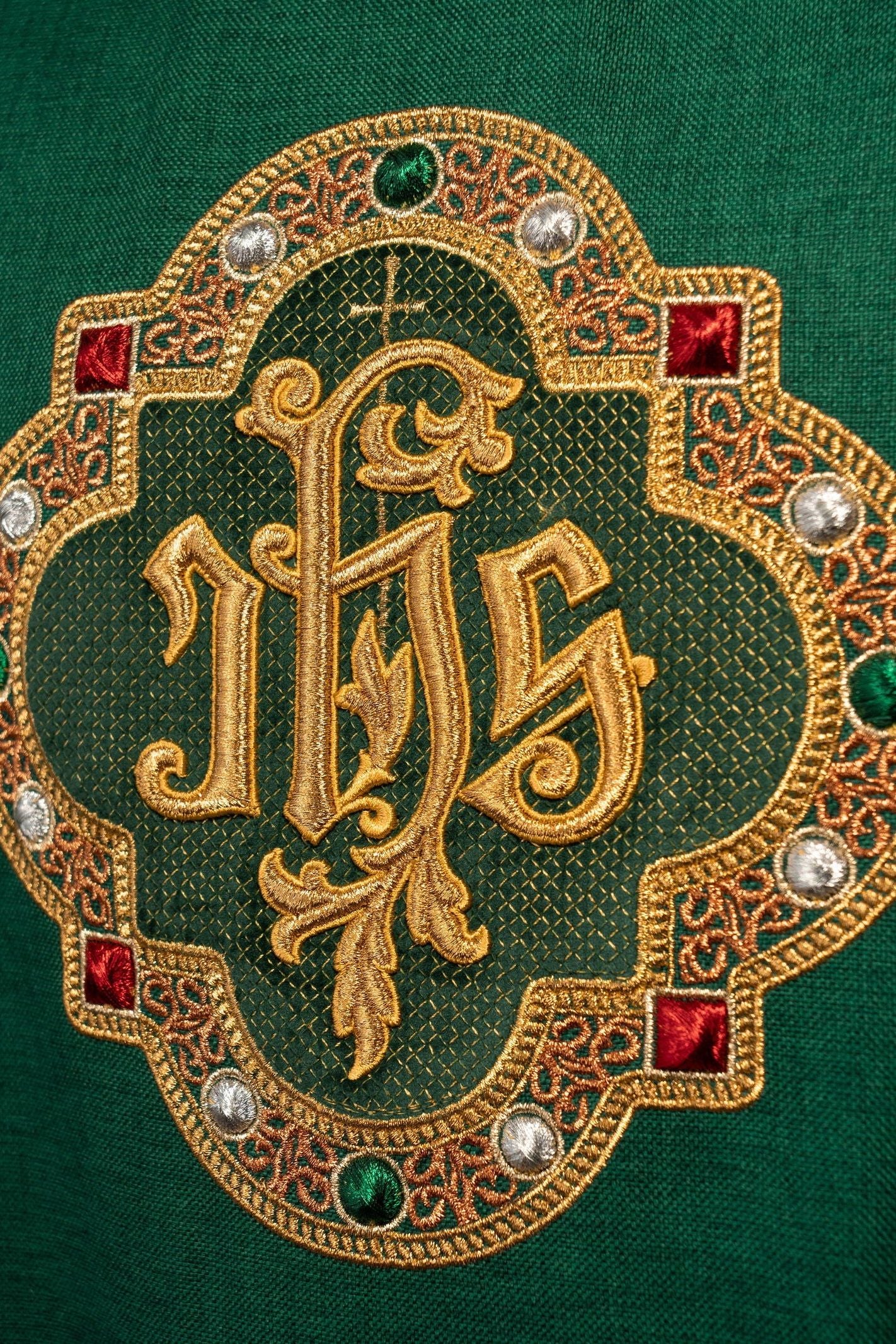 Chasuble with richly embroidered belt and piping around the IHS embroidery and collar in green