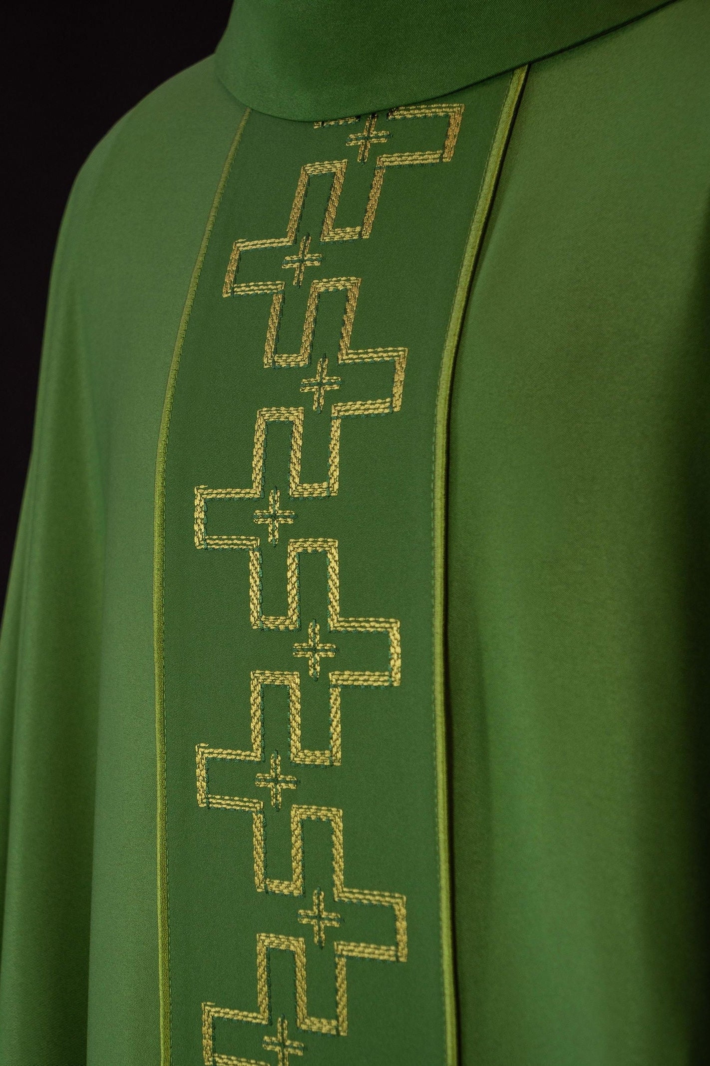 Chasuble with richly embroidered belt in embroidery of crosses in green color