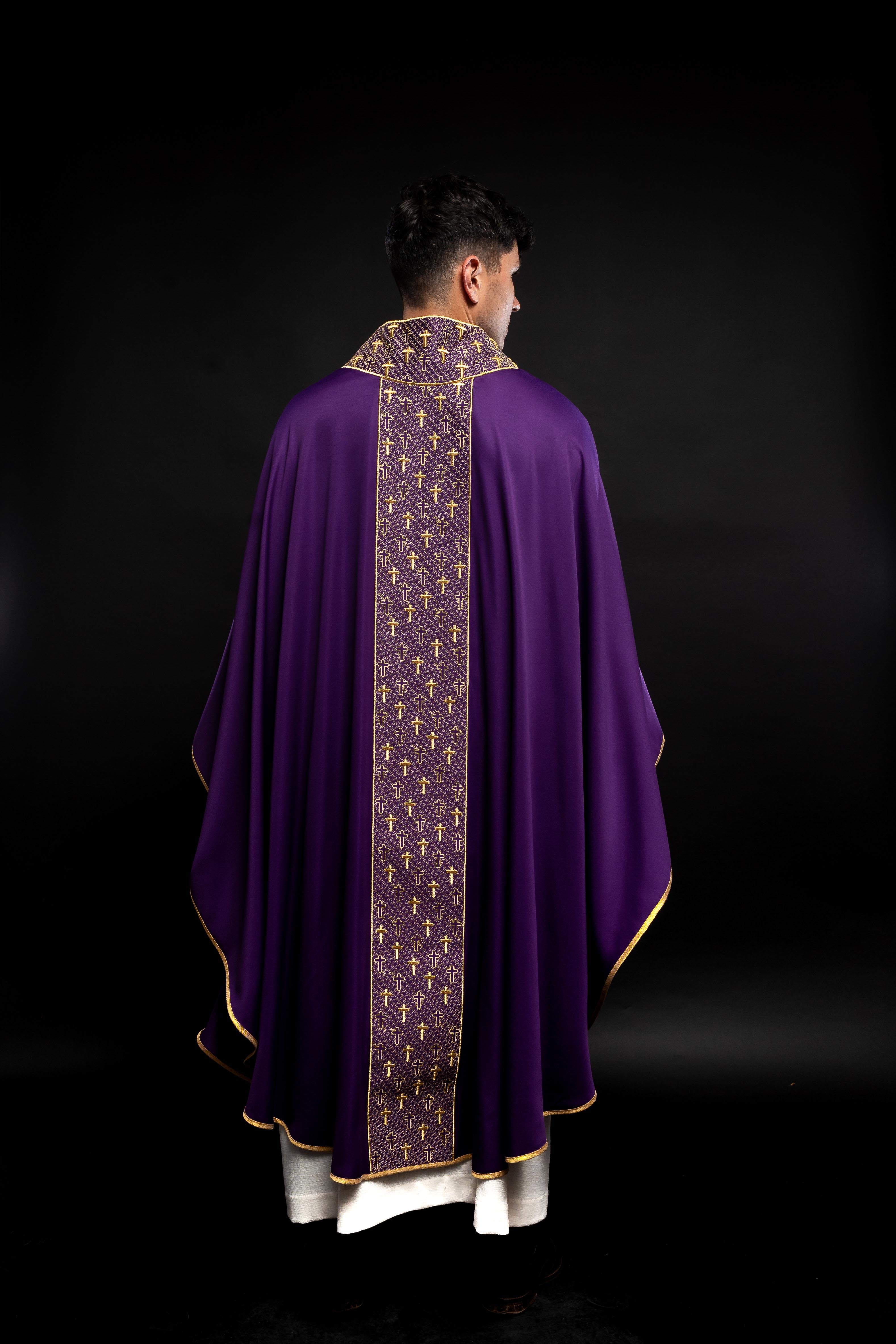 Purple chasuble with gold cross embroidery on wide orphrey and collar