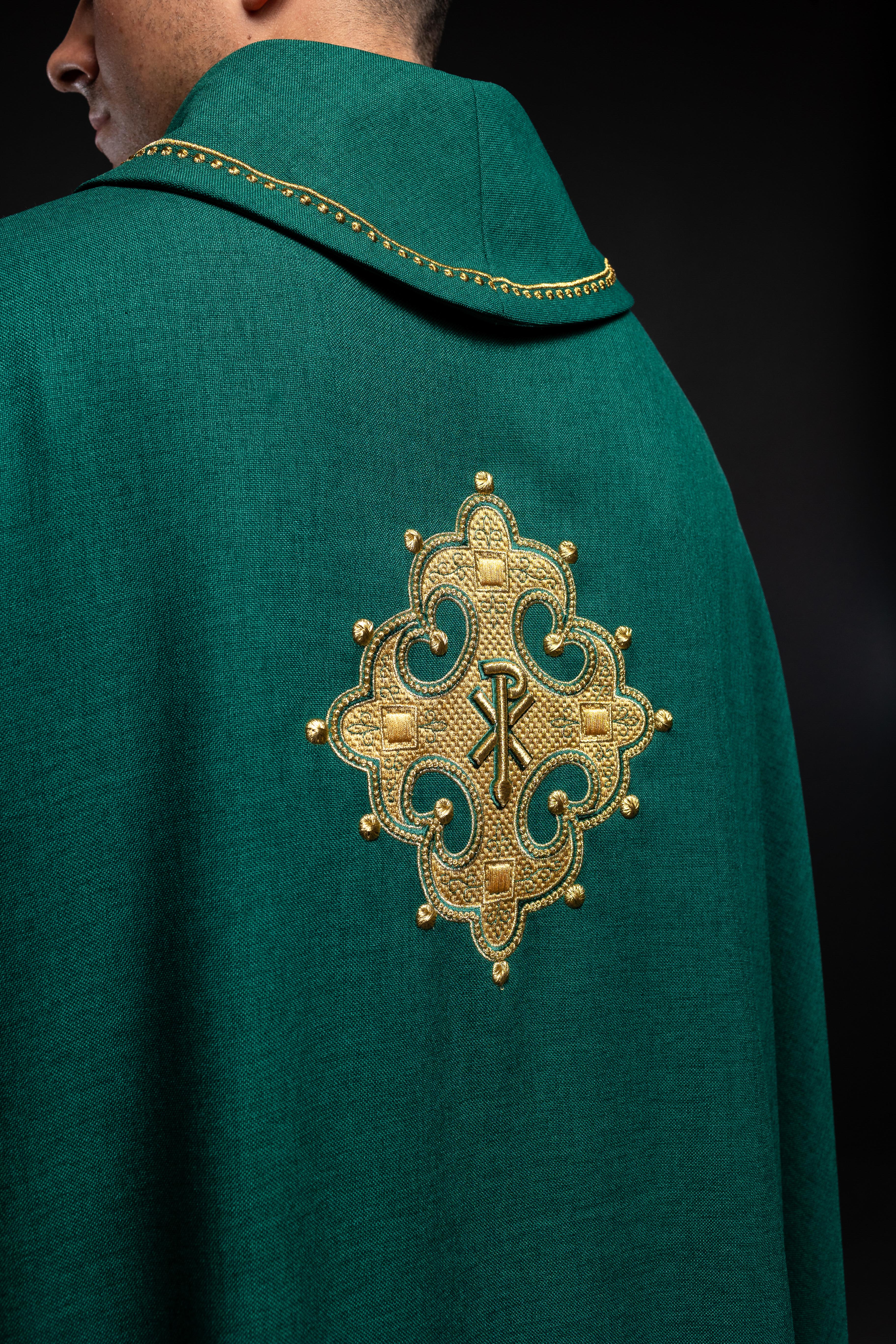 Green chasuble with gold PAX embroidery on chest and delicate embroidery on collar