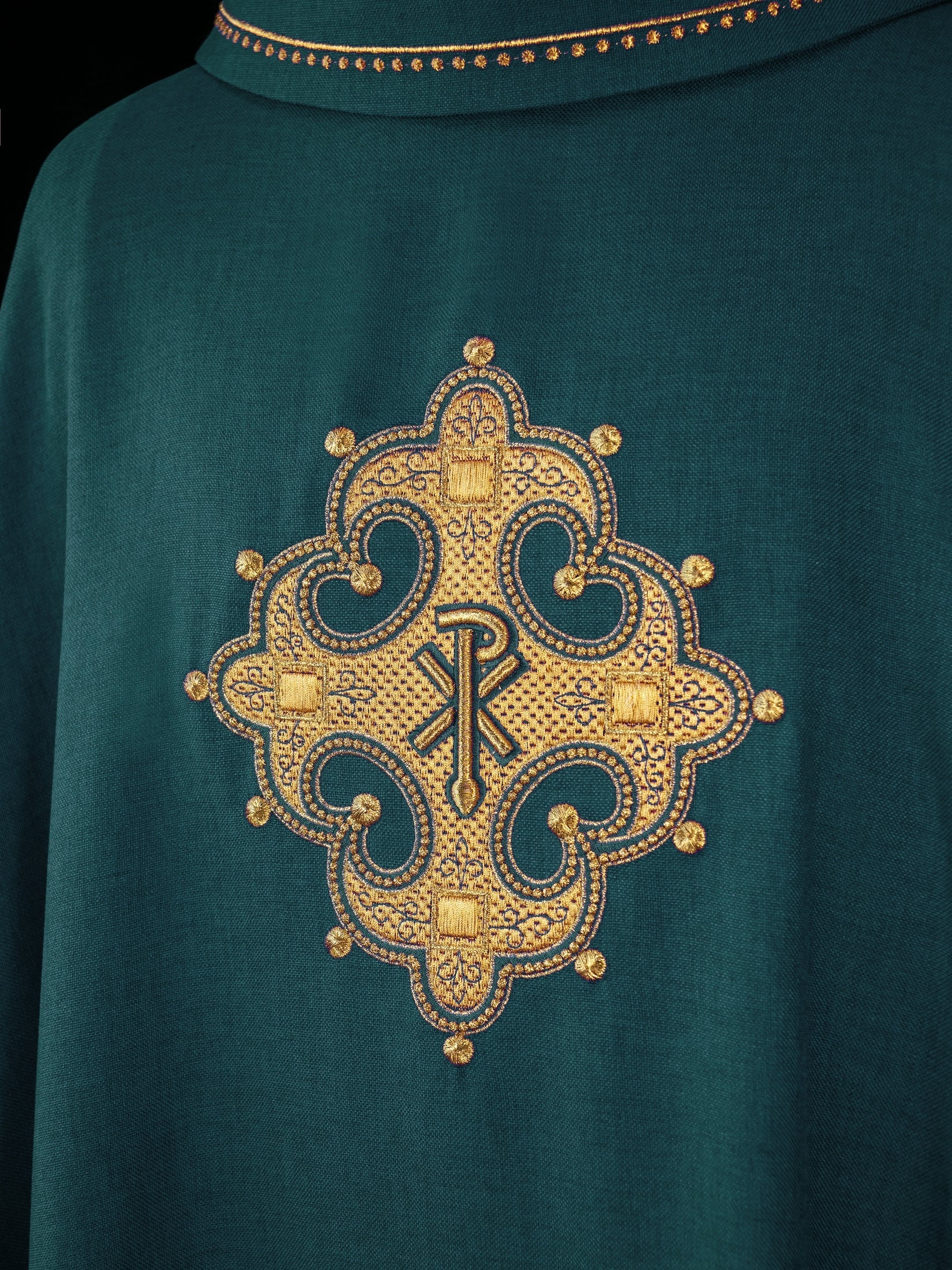 Green chasuble with gold PAX embroidery on chest and delicate embroidery on collar