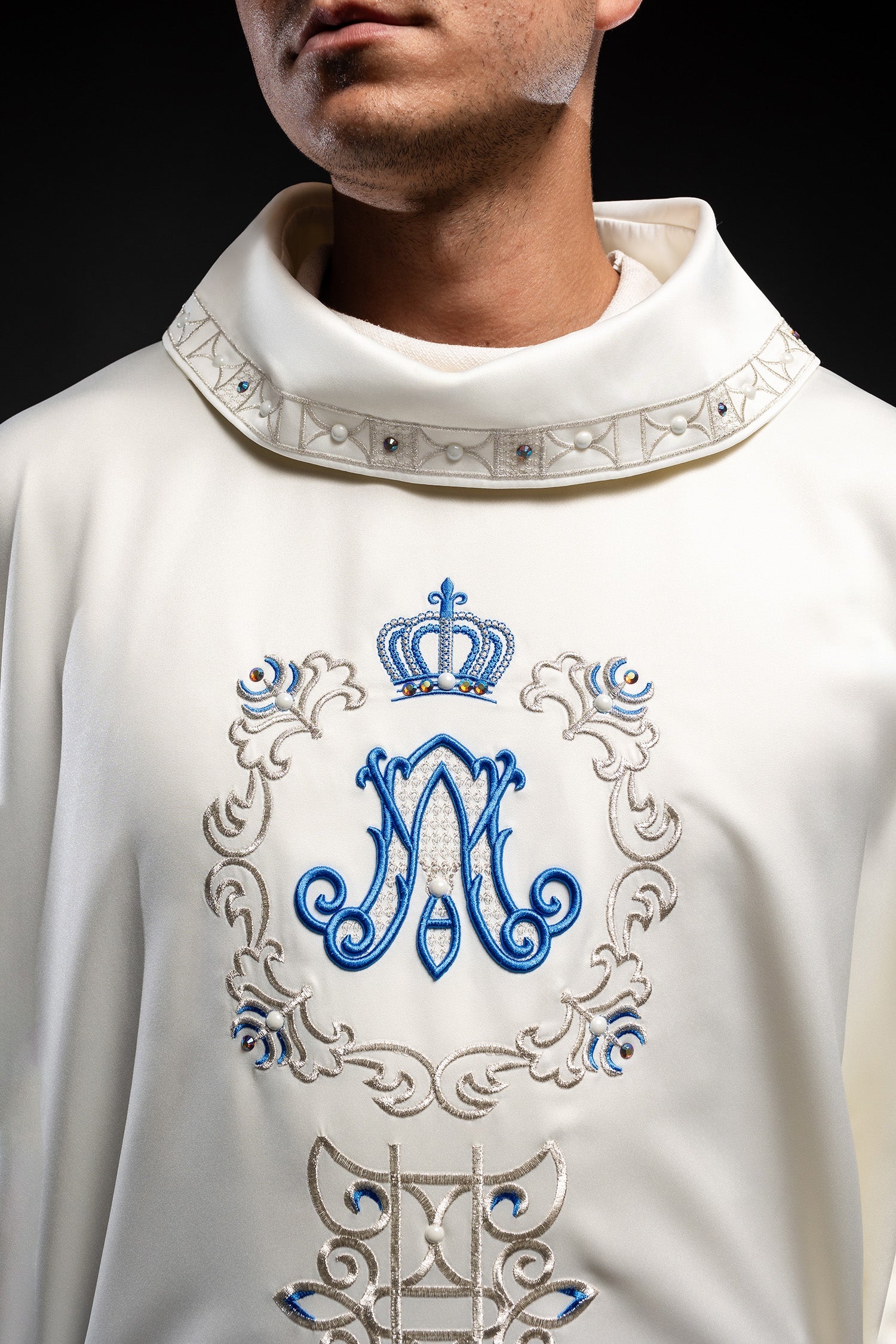 Ivory colored Marian chasuble finished with blue stones