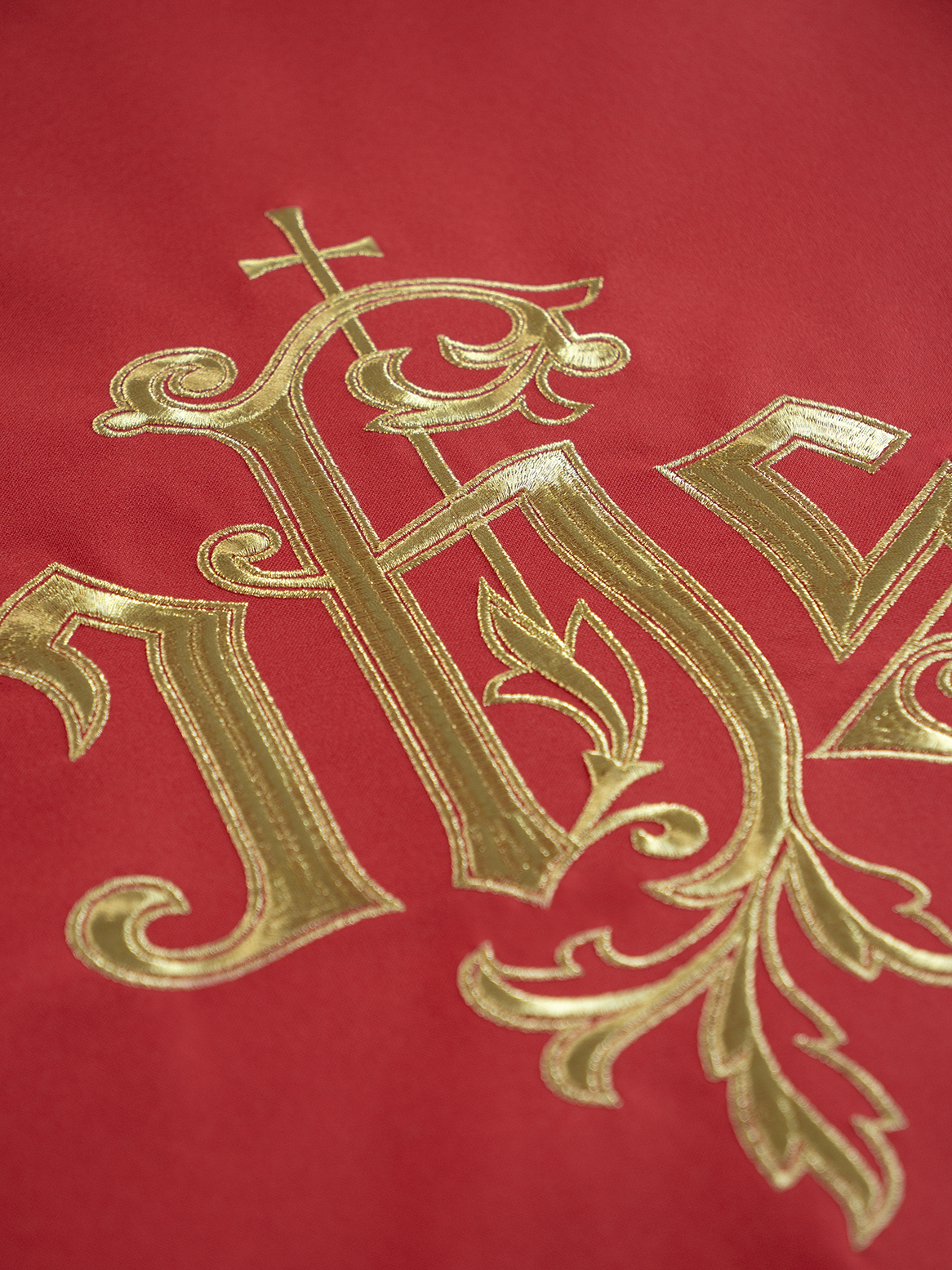 Lectern cover embroidered with IHS symbol in red