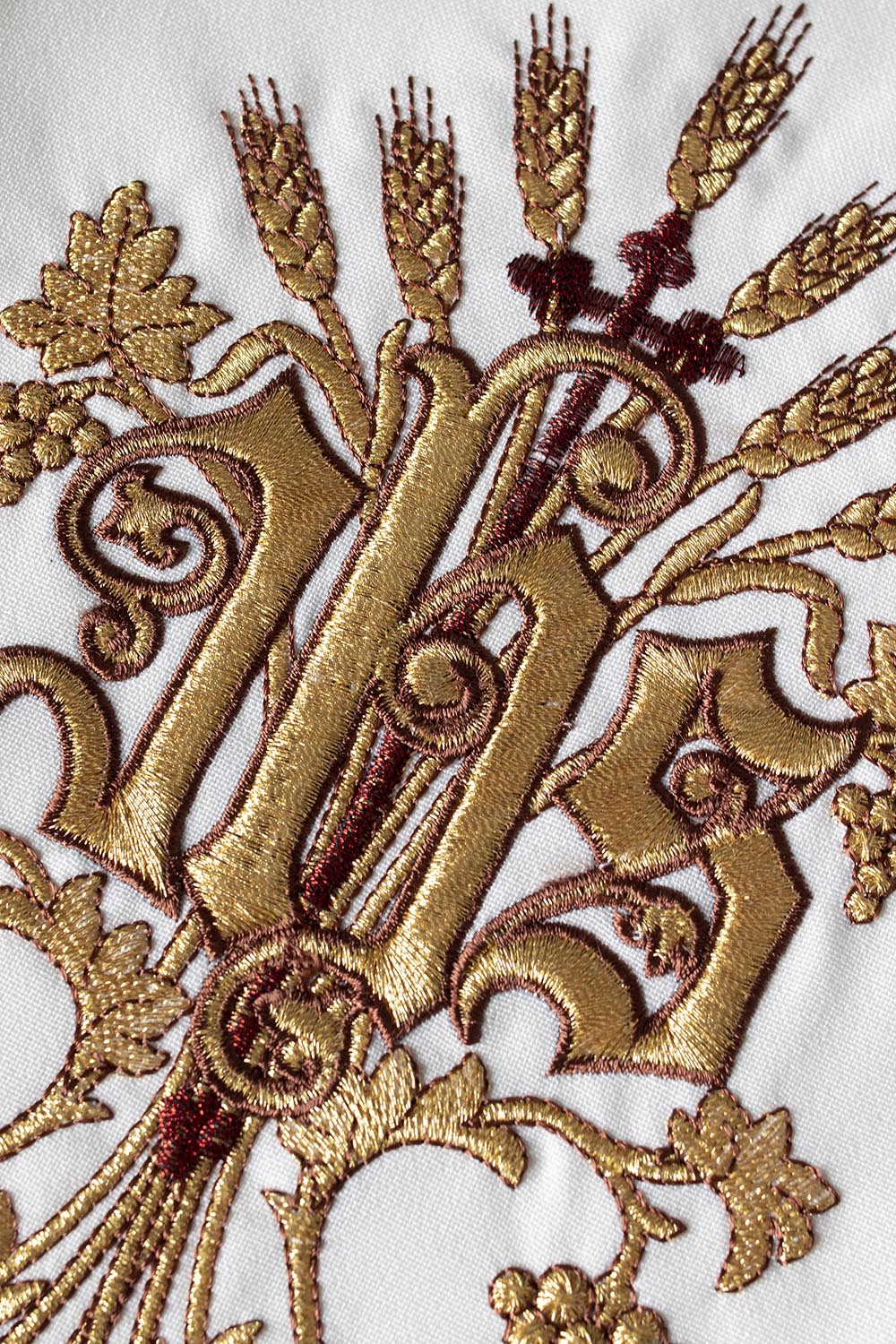 Ecru embroidered stole with a cross, IHS, and the heart of Jesus Christ