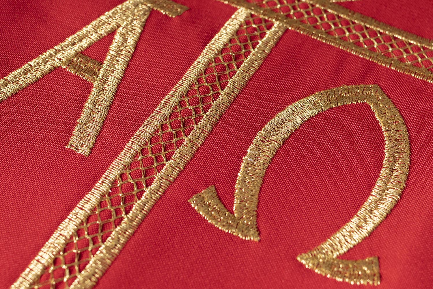 Red priestly stole embroidered with Alpha and Omega