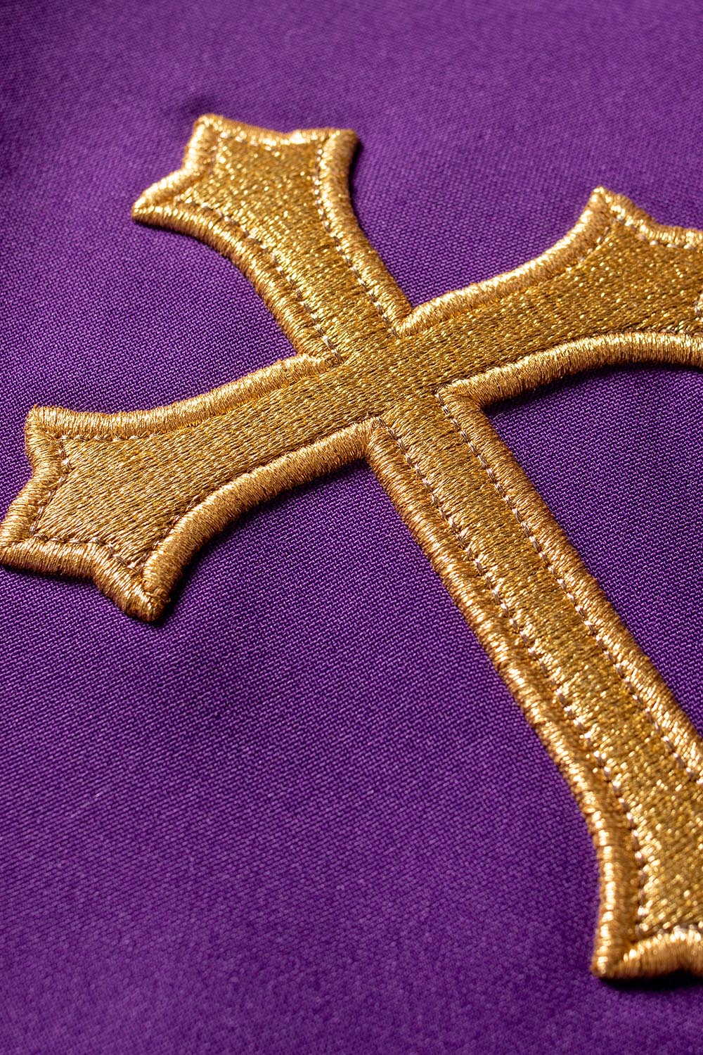 Purple priestly stole embroidered with a Cross