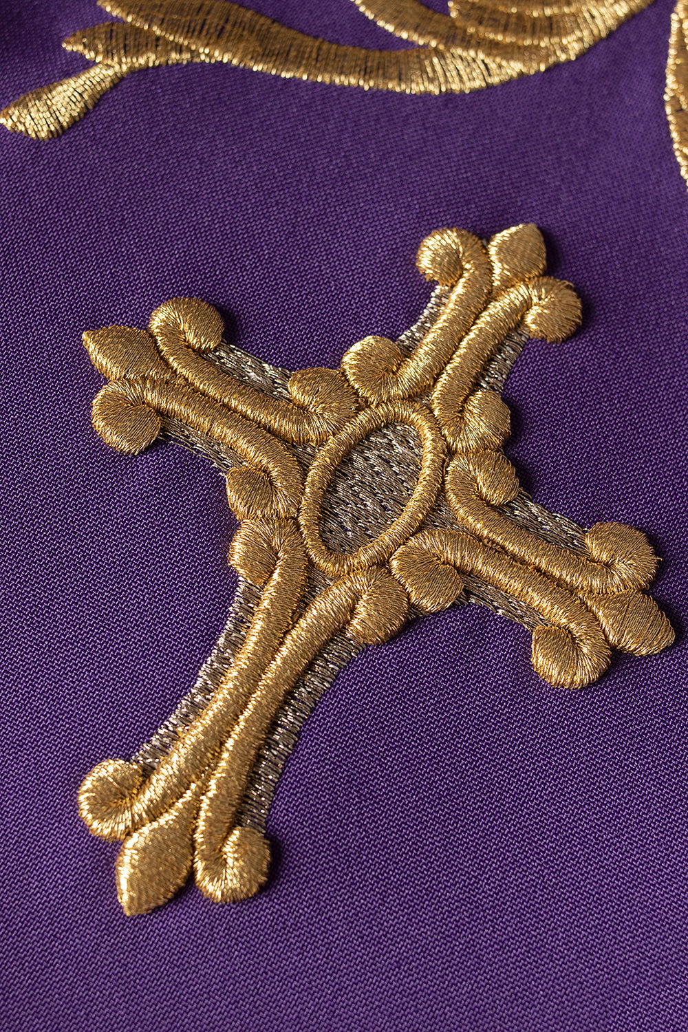 Purple priestly stole embroidered with a cross