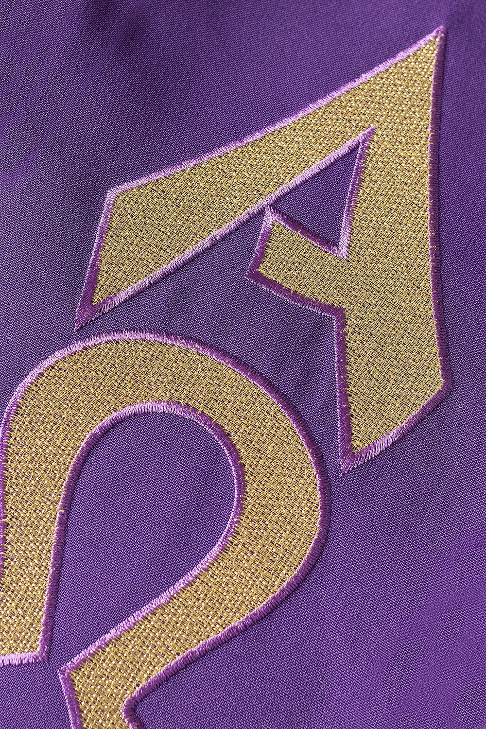 Purple priestly stole embroidered with Alpha and Omega