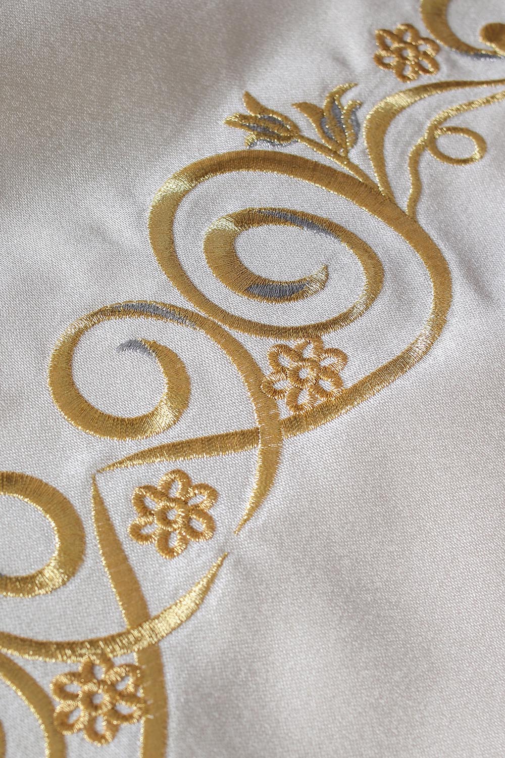 Golden liturgical veil embroidered with the IHS motif