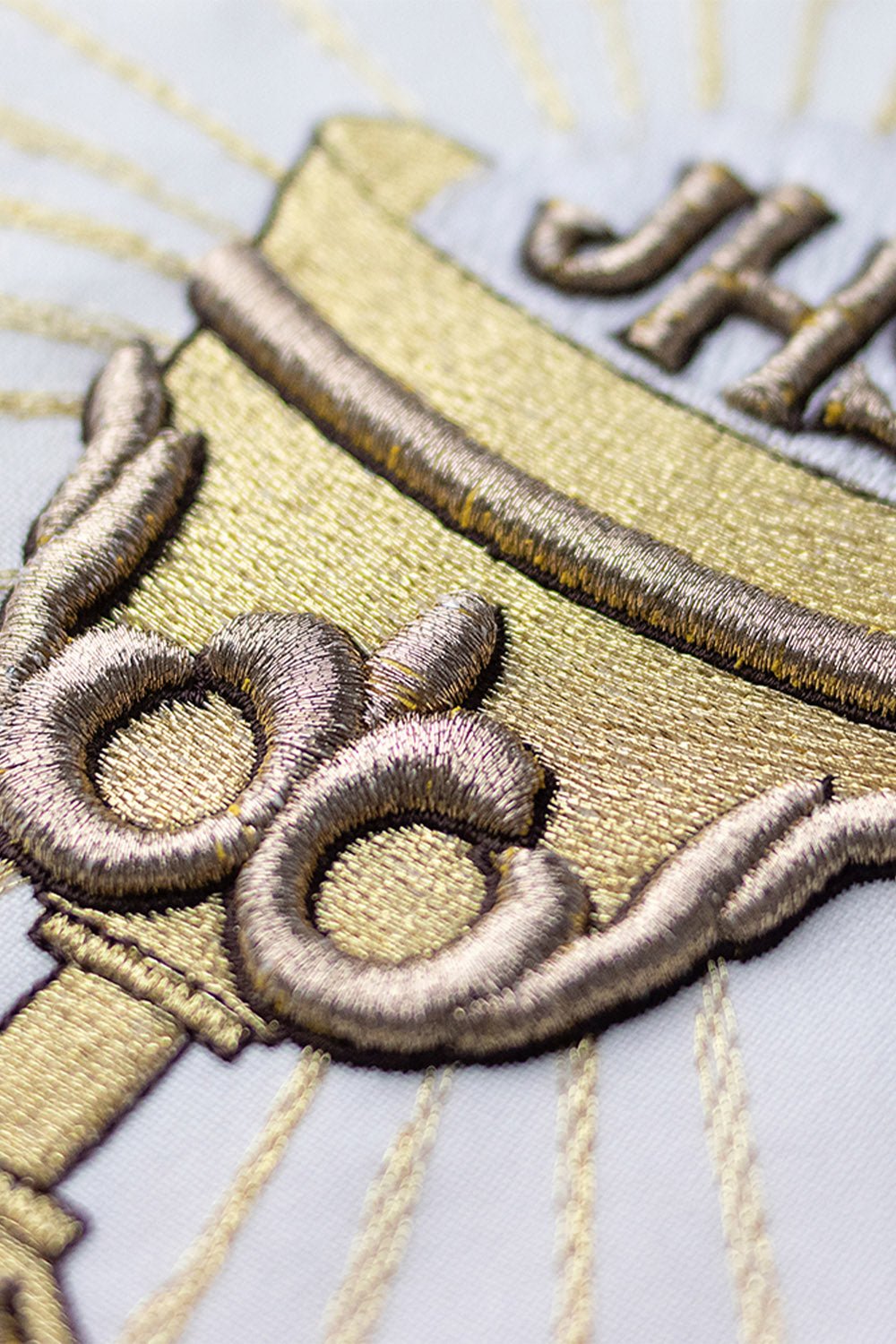 Chasuble with embroidered chalice symbol in ecru