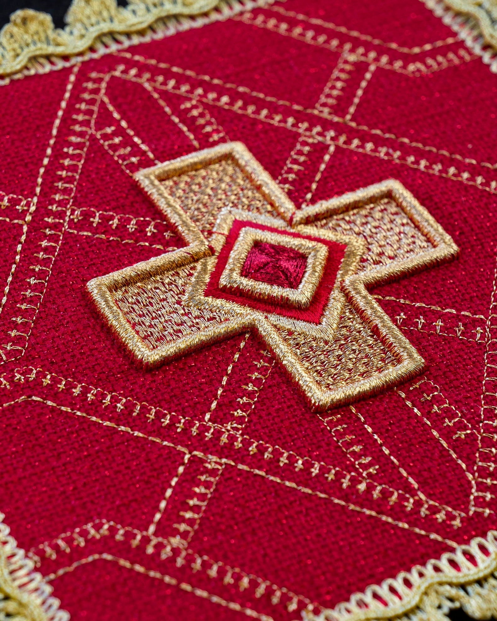 Set of four palls with golden embroidery