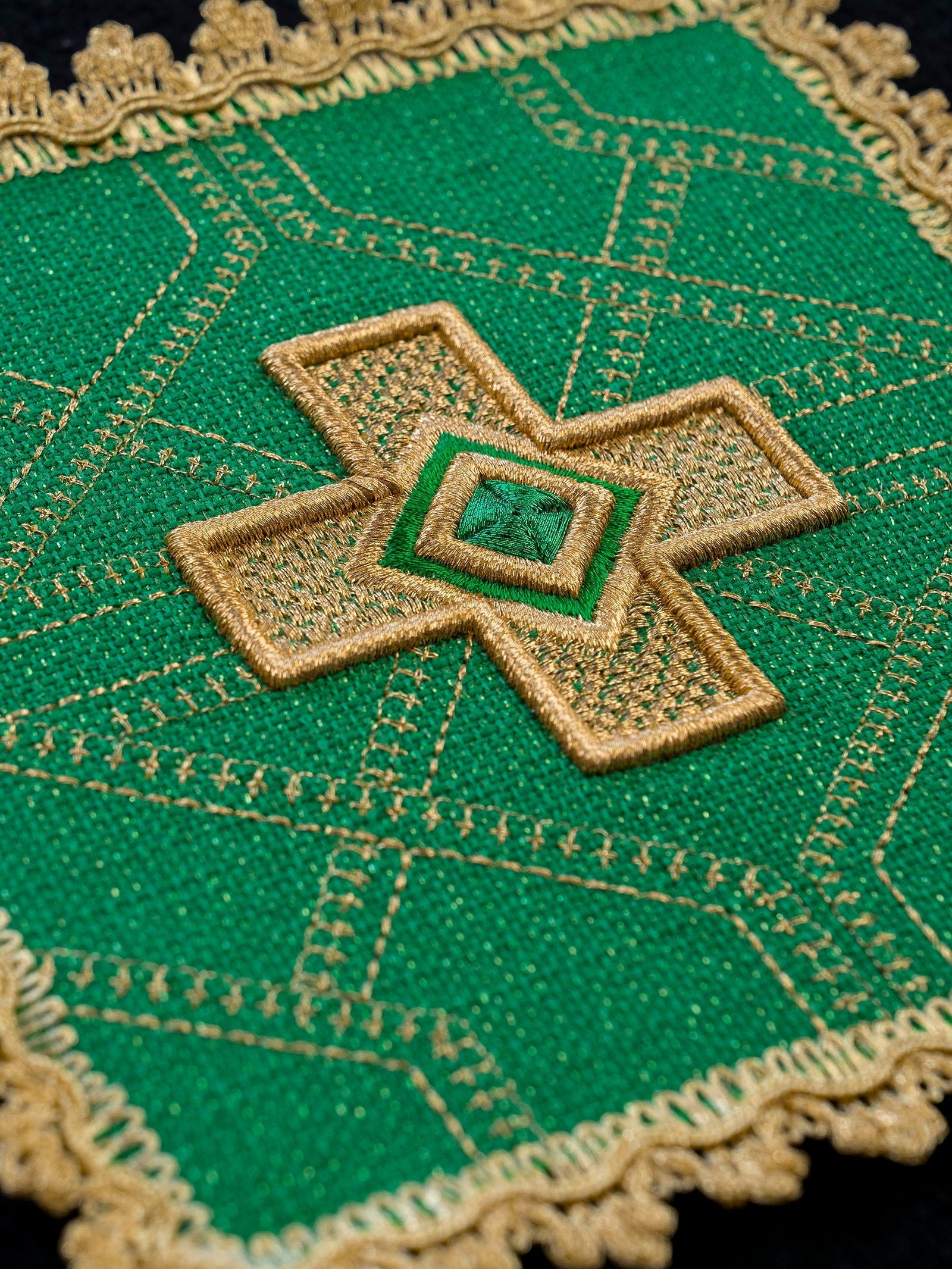 Set of four palls with golden embroidery