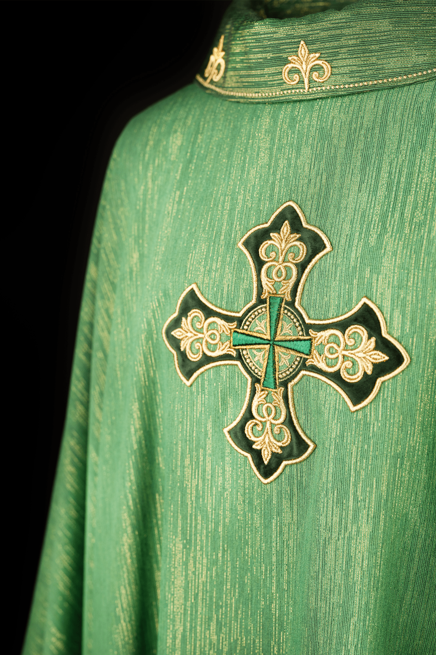 Green chasuble with embroidered cross and decorated collar