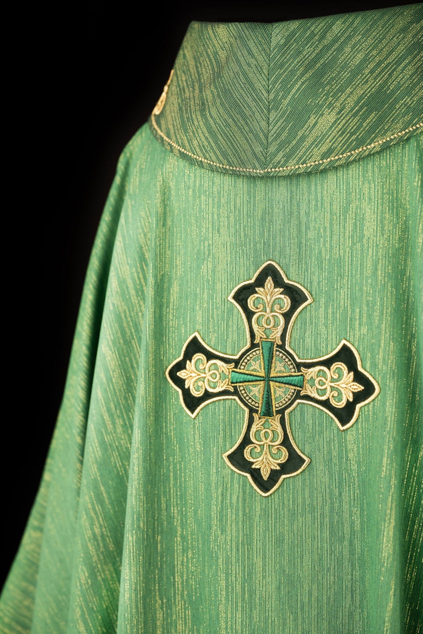 Green chasuble with embroidered cross and decorated collar