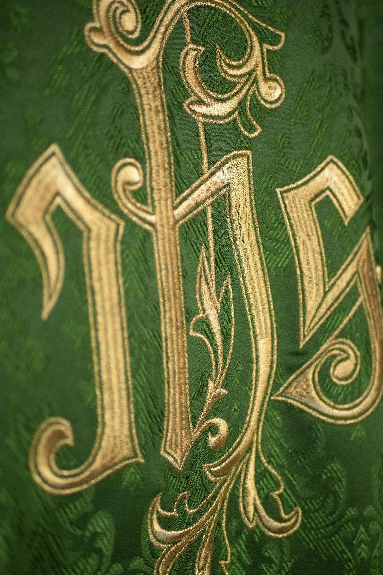 Chasuble made of green floral ornamental texture with classic IHS