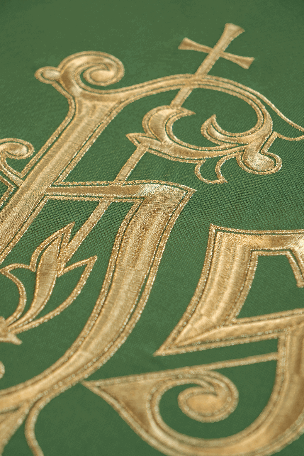 Green chasuble with classic JHS design